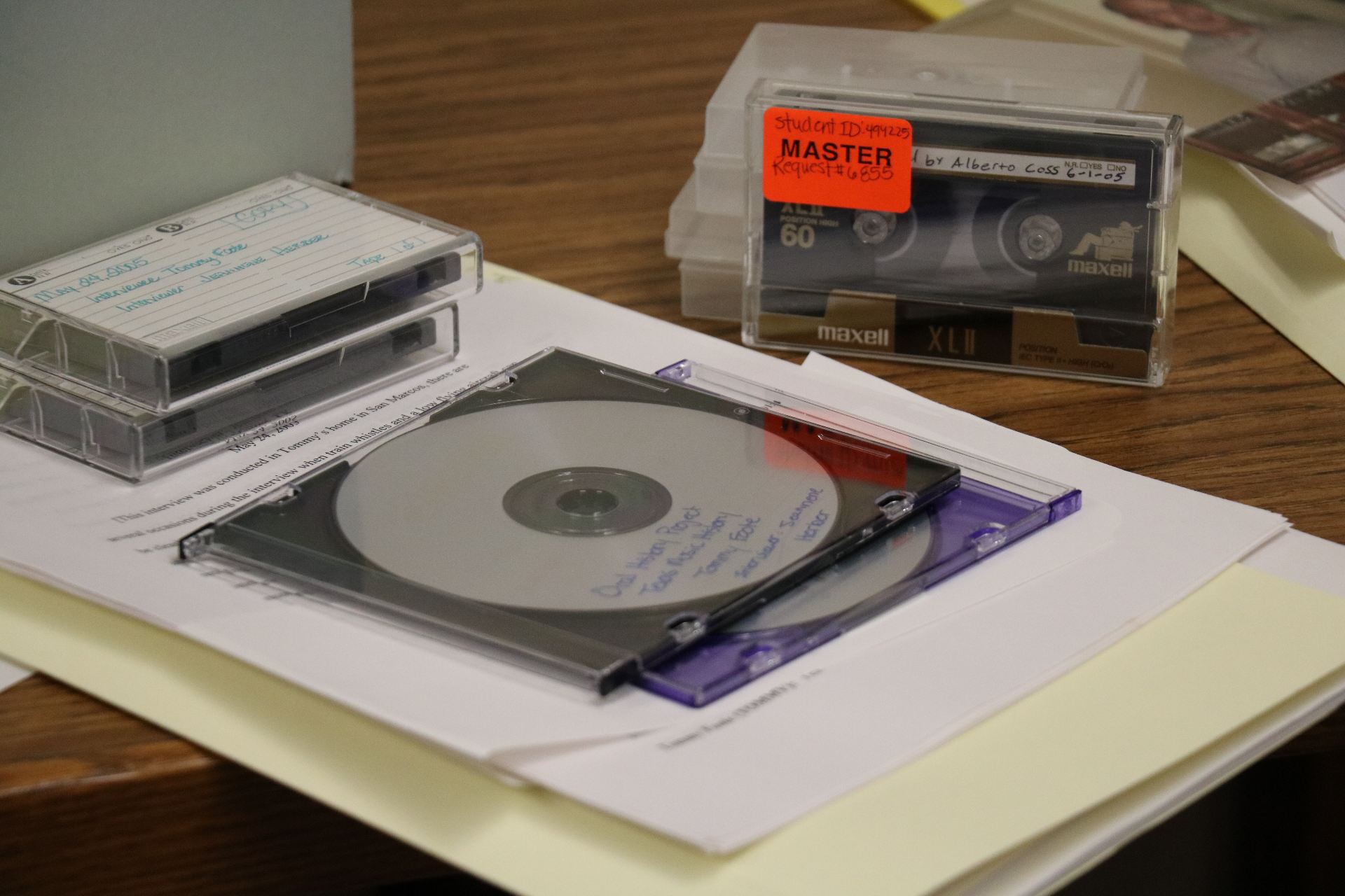 Image of CDs, audiocassettes, and folderst